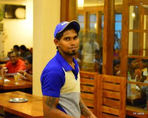 This guy works really hard, for that matter all the people there, they are on their toes!